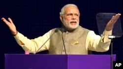 Indian Prime Minister Narendra Modi speaks at the Vibrant Gujarat summit in Gandhinagar, Jan. 11, 2015.