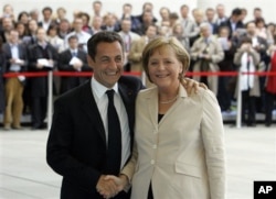 Angela Merkel et Nicolas Sarkozy (archives)