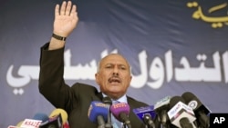 FILE - Yemeni then-President Ali Abdullah Saleh speaks to supporters during a gathering in Sana'a March 10, 2011.