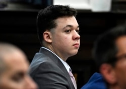 Kyle Rittenhouse listens as jurors are asked questions by the judge during jury selection at the Kenosha County Courthouse in Kenosha, Wisconsin, Nov. 1, 2021.