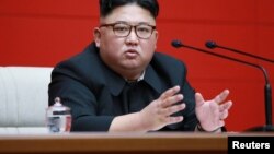 FILE - North Korean leader Kim Jong Un takes part in the 4th Plenary Meeting of the 7th Central Committee of the Workers' Party of Korea (WPK) in Pyongyang in this April 10, 2019, photo released April 11, 2019 by North Korea's Korean Central News Agency.