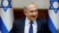 FILE - Israeli Prime Minister Benjamin Netanyahu attends the weekly cabinet meeting in Jerusalem, July 30, 2017. 