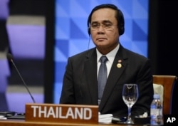 FILE - Thailand's Prime Minister Prayut Chan-o-cha listens to the opening remarks during the plenary session at the Asia-Pacific Economic Cooperation (APEC) Summit in Manila, Philippines, Nov. 19, 2015.