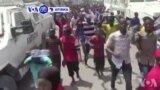 VOA60 AFIRKA: A Kasar Somaliya Dubban Mutane Sun Yi Zanga zanga A Birnin Mogadishu