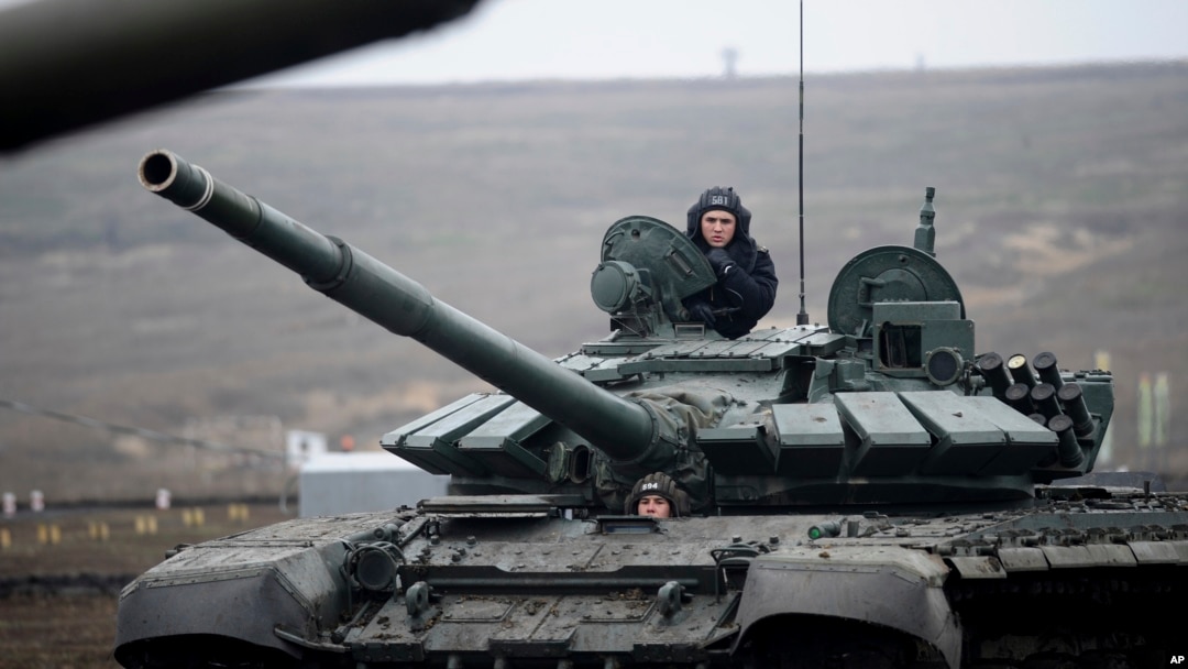 Russian troops take part in drills at the Kadamovskiy firing range in Russia's southern Rostov region, near the country's border with Ukraine, Dec. 14, 2021.