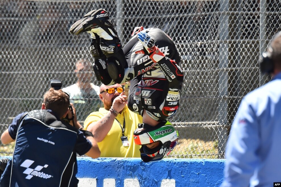 Moto2 rider Johann Zarco (Kalex), celebrates after winning the race as part of the Italian Moto Grand Prix at the racetrack in Mugello.