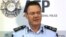 Australian Federal Police Deputy Commissioner Michael Phelan speaks to the media that two Sydney men have been arrested by the Joint Counter Terrorism team in Sydney, Australia, Wednesday, Dec. 24, 2014.