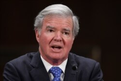 FILE - In this Feb. 11, 2020, file photo, NCAA President Mark Emmert testifies during a Senate Commerce subcommittee hearing on intercollegiate athlete compensation on Capitol Hill in Washington.