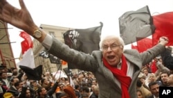 George Ishak, founder of the Kefaya (Enough) Movement and one of the leaders for National Coalition for Change, shouts anti-government slogans during a protest in front of the High Court in Cairo (File Photo - December 12, 2010)