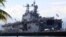 FILE - The amphibious assault ship USS Peleliu is seen docked following joint exercises at the Alava pier, off Subic Bay Freeport zone, northwestern Philippines, Oct. 13, 2014, as part of the Visiting Forces Agreement.