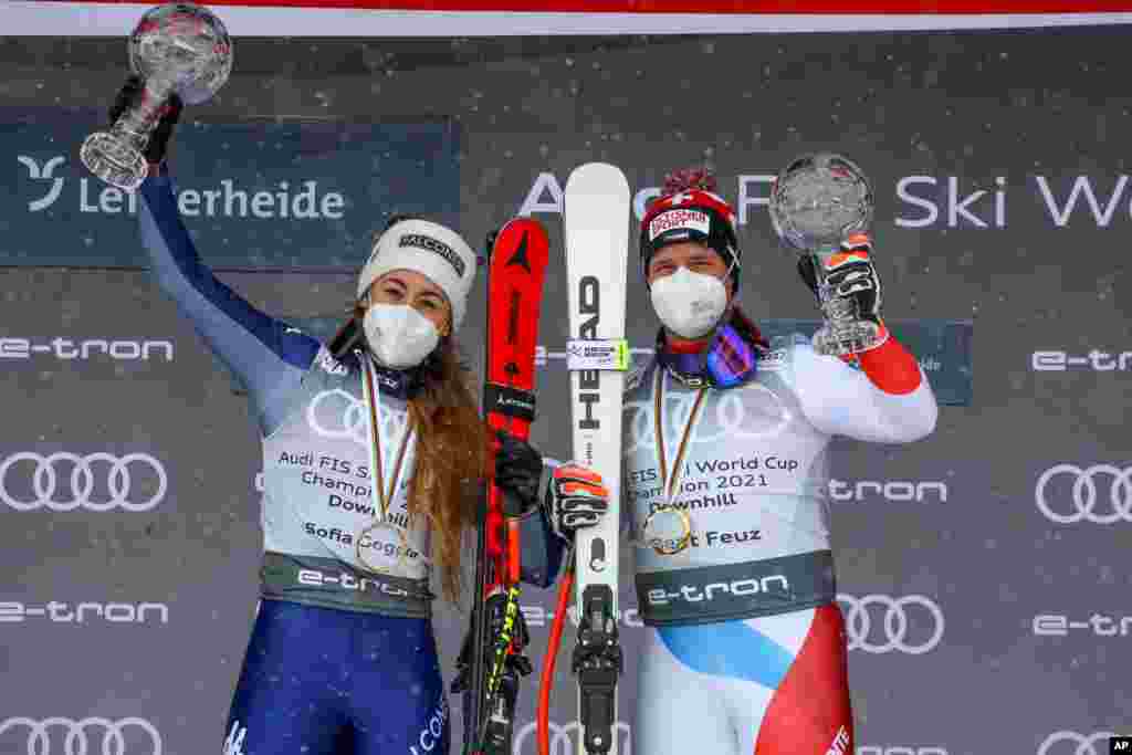 بیت فیوز سوئیسی (چپ) و سوفیا گوگیا ایتالیایی برندگان جام اسکی آلپاین در مسابقات جهانی اسکی در لنزرهاید، سوئیس شدند.