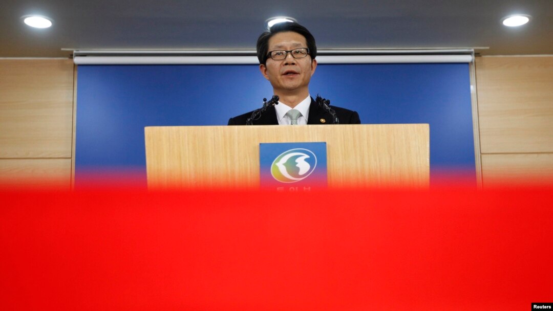 FILE - South Korea's Unification Minister Ryoo Kihl-jae releases a government statement during a news conference at the Unification Ministry in Seoul.