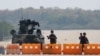 Myanmar military checkpoint is seen on the way to the congress compound in Naypyitaw, Myanmar, Feb. 1, 2021. 