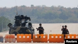 Myanmar military checkpoint is seen on the way to the congress compound in Naypyitaw, Myanmar, Feb. 1, 2021. 