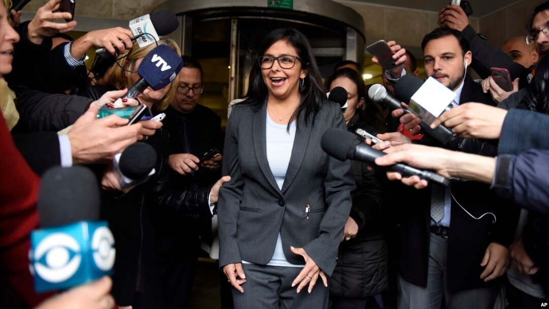 FILE - Venezuela's Delcy Rodriguez speaks to reporters as she leaves a meeting with fellow foreign ministers to discuss the transition of the presidency of Mercosur in Montevideo, Uruguay, July 11, 2016. The founding members of Mercosur will give Venezuela until December 1 to meet its membership requirements or be suspended from the bloc.