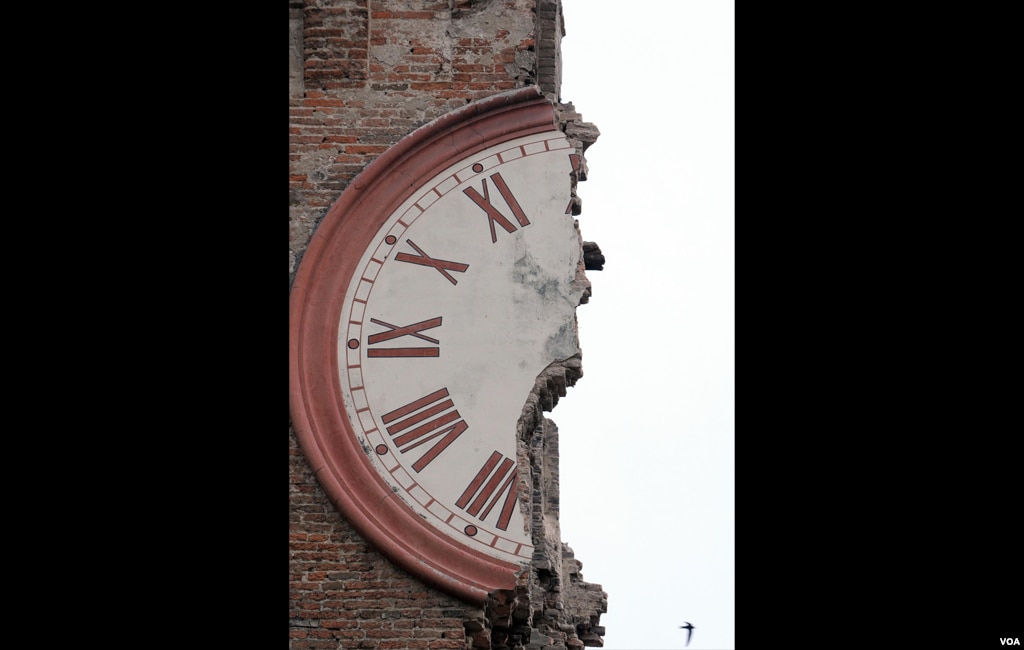 The damaged clock tower of Finale Emilia, Italy, May 20, 2012. A magnitude 6 earthquake shook northern Italy early May 20, killing at least four people. (AP Photo/Gianfilippo Oggioni, Lapresse)