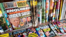 National Enquirer là một tờ báo lá cải chuyên đăng những chuyện giật gân về những người nổi tiếng và thường được bày bán trong các siêu thị ở Mỹ.