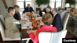 On Nov. 24 2004, President George W. Bush and first lady Laura Bush host Spain's King Carlos at a Thanksgiving-style luncheon at their ranch in Crawford, Texas. (George W. Bush Presidential Library and Museum/White House Historical Association)