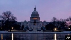 FILE - The U.S. Capitol building is seen at sunrise in Washington, Feb. 9, 2018. 