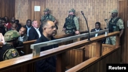 Mozambique's former finance minister Manuel Chang appears in court during an extradition hearing in Johannesburg, South Africa, Jan. 8, 2019. 