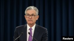 Jerome Powell, presidente de la Reserva Federal, o Banco Central de EE.UU., habla con periodistas luego de la reunión de dos días del Comité de Políticas de Mercados Abiertos de la Fed, en Washington, el 30 de enero de 2019.