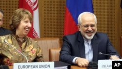 AB dışpolitika yetkilisi Catherine Ashton ve İran Dışişleri Bakanı Cevat Zarif Viyana'da yeni tur görüşmelere başlarken