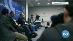 Russian Police Raid Pro-Democracy Forum 