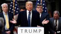 Republican presidential candidate Donald Trump speaks during a campaign event in the atrium of the Old Post Office Pavilion, in Washington, soon to be a Trump International Hotel, March 21, 2016.