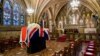 Thatcher's Body Lies in Chapel as Funeral Debate Rages