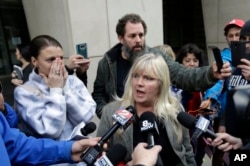 Defendant Shawna Cox speaks outside federal court in Portland, Ore., Oct. 27, 2016. A jury exonerated brothers Ammon and Ryan Bundy and five others of conspiring to impede federal workers from their jobs at the Malheur National Wildlife Refuge.