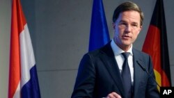 FILE - Dutch Prime Minister Mark Rutte speaks at an event in Berlin, March 2, 2018.