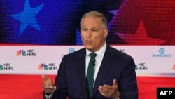  Democratic presidential hopeful Governor of Washington Jay Inslee speaks during the first Democratic primary debate of the 2020 presidential campaign at the Adrienne Arsht Center for the Performing Arts in Miami, June 26, 2019. 