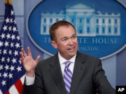 FILE - The director of the White House Office of Management and Budget, Mick Mulvaney, speaks to reporters during a daily press briefing at the White House in Washington, Feb. 27, 2017.