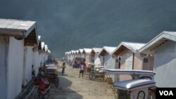 "Bunkhouses" or temporary housing for people who had been living in evacuation sites since the storm. Each structure can house up to 24 families of five. The community shares a common kitchen, bathrooms and medical facility. (Simone Orendain for VOA)