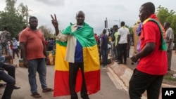 Thousands marched on July 10, 2020, in Bamako in anti-government demonstrations urged by an opposition group that rejects the president's promises of reforms.