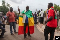 Thousands marched on July 10, 2020, in Bamako in anti-government demonstrations urged by an opposition group that rejects the president's promises of reforms.