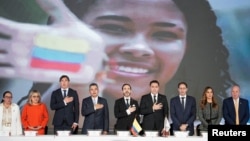 Colombia's President-elect Abelardo de la Espriella and Vice President-elect Jose Manuel Restrepo, with  members of Colombia's National Electoral Council in Bogota, Colombia.