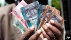South Sudan lawmakers summoned the central bank governor and ordered him to reverse a currency devaluation that caused prices to spike after it took effect earlier this week.