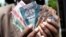 South Sudan lawmakers summoned the central bank governor and ordered him to reverse a currency devaluation that caused prices to spike after it took effect earlier this week.