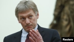 Kremlin spokesman Dmitry Peskov attends a meeting of Russian President Vladimir Putin at the Kremlin in Moscow, March 26, 2018. 