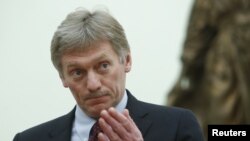 Kremlin spokesman Dmitry Peskov attends a meeting of Russian President Vladimir Putin at the Kremlin in Moscow, March 26, 2018.