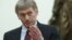Spokesman Dmitry Peskov gestures at the Kremlin in Moscow, Russia, March 26, 2018. 