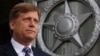 U.S. Ambassador Michael McFaul walks outside as he leaves the Russian Foreign Ministry headquarters in Moscow, May 15, 2013.