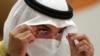 FILE - Nayef Falah Al-Hajraf, secretary-general of the Gulf Cooperation Council, wears a face mask to help curb the spread of the coronavirus as he speaks at a press conference during the 41st GCC meeting being held in Al Ula, Saudi Arabia, Jan. 5, 2021. 