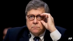 FILE - Then-Attorney General nominee William Barr testifies during a Senate Judiciary Committee hearing on Capitol Hill in Washington, Jan. 15, 2019.