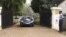 A Kenyan policeman stands outside the charge d'affaires residence in Runda estate in Nairobi, Kenya, July 27, 2012. The acting Venezuelan envoy to Kenya was dead Friday at the official residence, police said. 