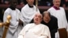 Pope Francis attends a ceremony for the creation of new cardinals at St. Peter's Basilica in Vatican City on Dec. 7, 2024. Observers noticed a significant bruise on the pope's chin.