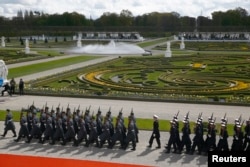 Guard of honor arrives before the welcome ceremony of U.S. President Barack Obama at Schloss Herrenhausen in Hanover, Germany, April 24, 2016.
