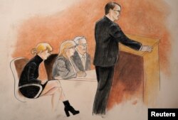 Taylor Swift, mother Andrea and attorney Jesse Schaudies (at table) listen to closing arguments in Denver Federal Court where the Taylor Swift groping trial goes on in Denver, Aug. 14, 2017.