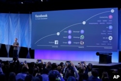 FILE- Facebook CEO Mark Zuckerberg talks about the company's 10-year roadmap during the keynote address at the F8 Facebook Developer Conference in San Francisco, April 12, 2016.